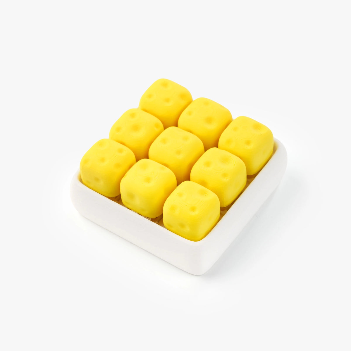 Nine small yellow cube-shaped items