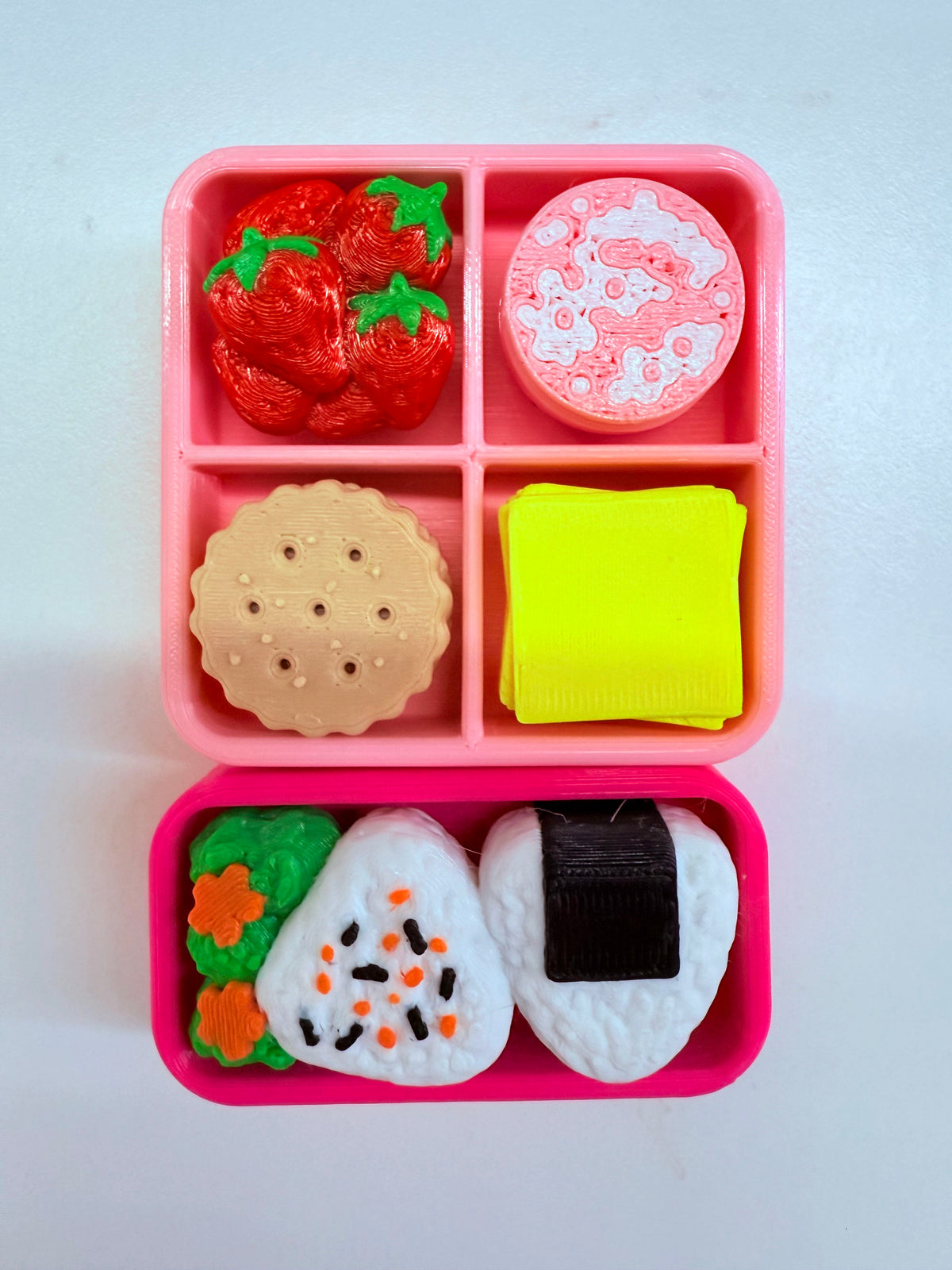 A pink compartment bento box
