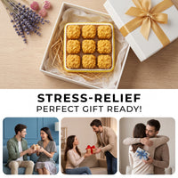 A gift set of nine golden-brown stress-relief cookies