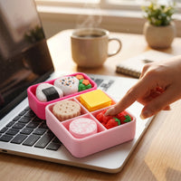 A pink compartment lunch box