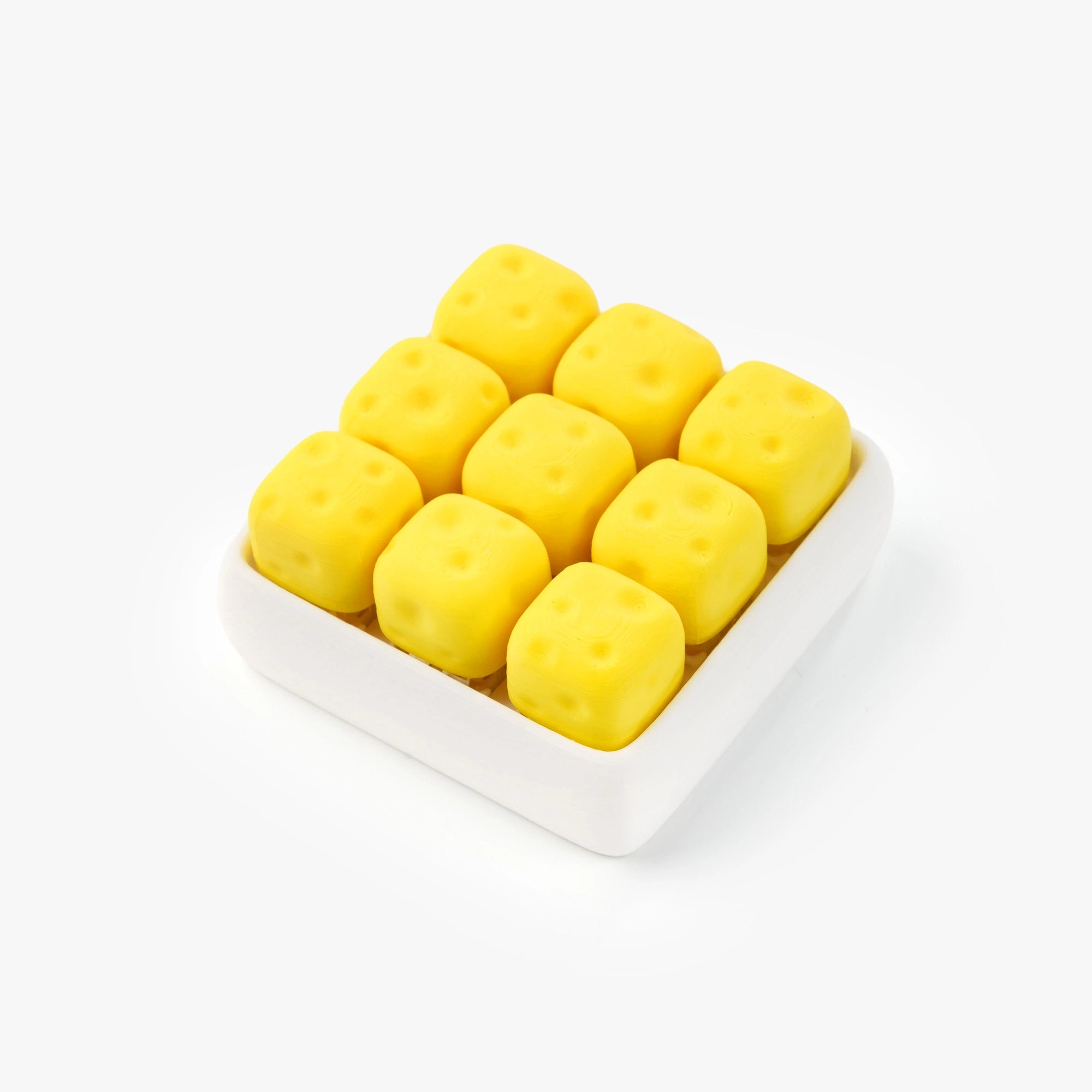 Nine small yellow cube-shaped items