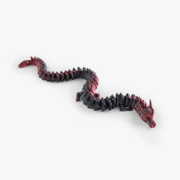 Flexed Nexbie 3D printed articulated dragon