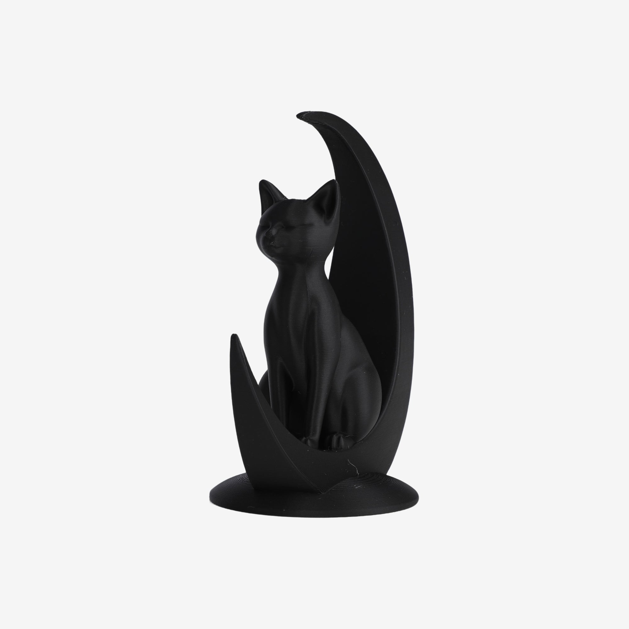Black Minimalist Cat sitting on crescent moon