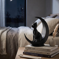Minimalist Cat moon sculpture on cozy desk