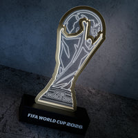 FIFA World Cup 2026 trophy lamp on a dark background