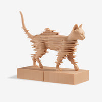 Angled view of Gold Glitchy Cat 3D printed sculpture