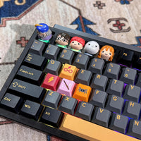 Harry Potter character keycaps on keyboard