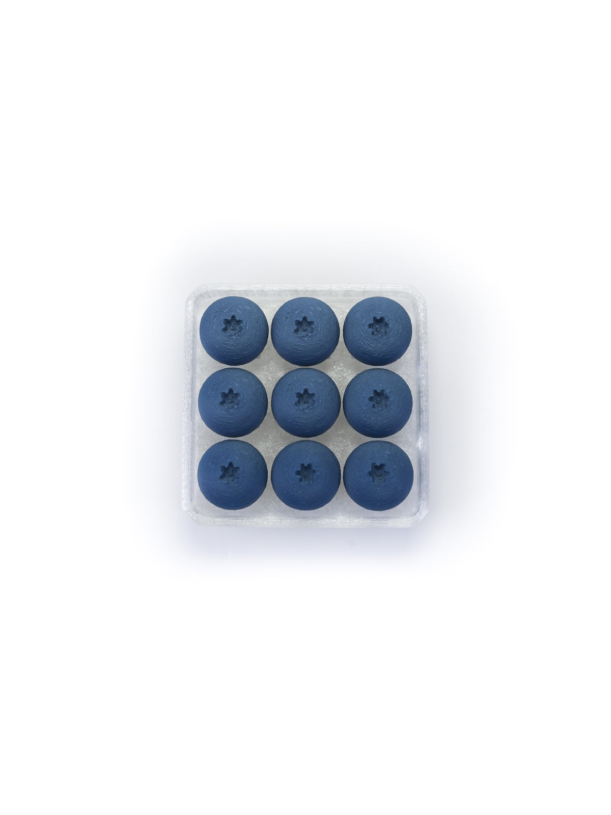Nine dark blue oval pills