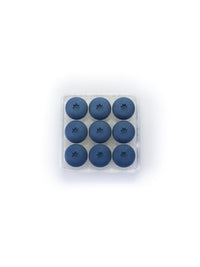 Nine dark blue oval pills