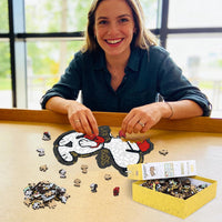 Snoopy wooden puzzle solved on table