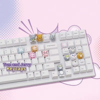 Tom & Jerry keycaps on a keyboard and number pad