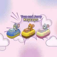 Tom, Jerry and Tuffy keycaps on colorful bases